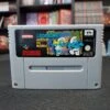 LES SCHTROUMPFS AUTOUR DU MONDE CARTOUCHE SEULE FAH SNES -Promos Jeu Boutique les schtroumpfs autour du monde cartouche seule fah snes