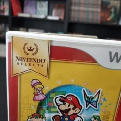 SUPER PAPER MARIO COMPLET SANS CARTE VIP JAQUETTE ABIMEE WII -Promos Jeu Boutique super paper mario complet sans carte vip jaquette abimee wii 3
